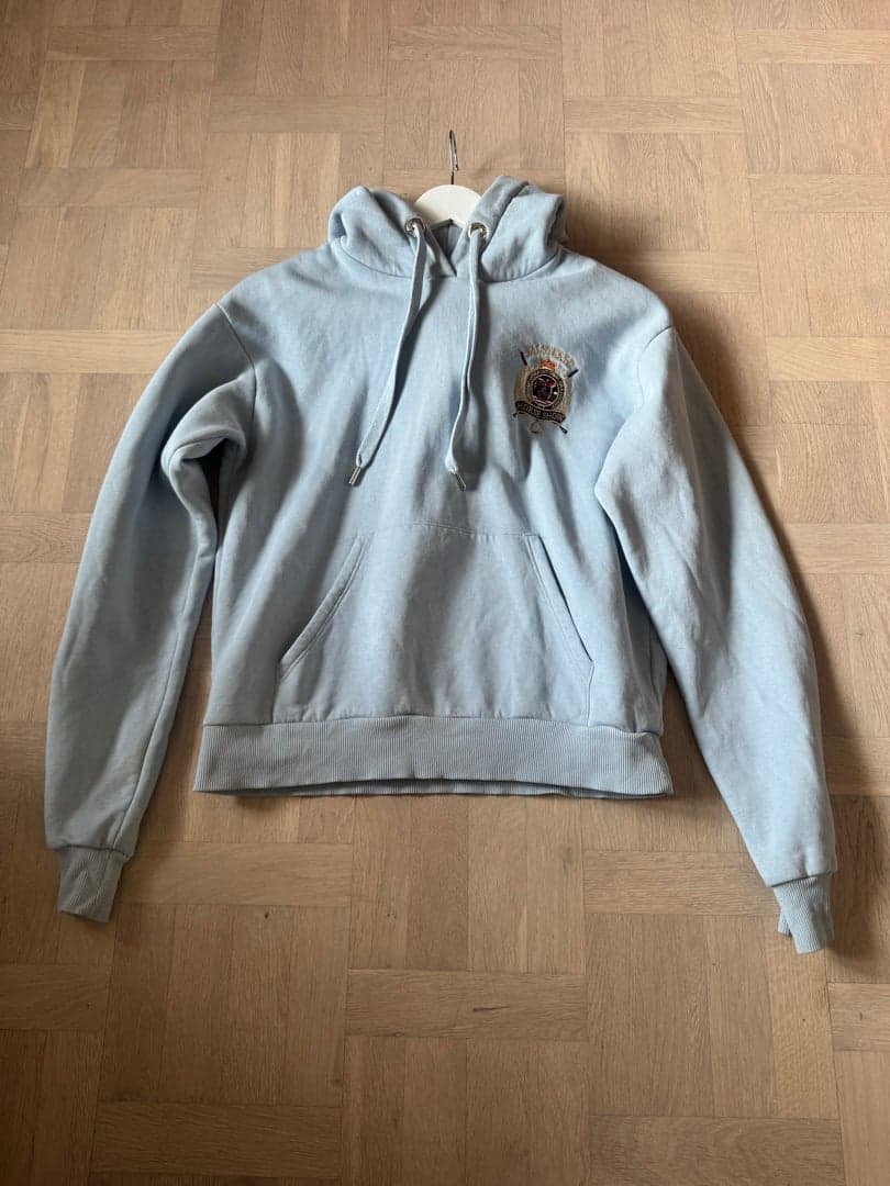 Image 1 of Ljusblå falsterbohoodie