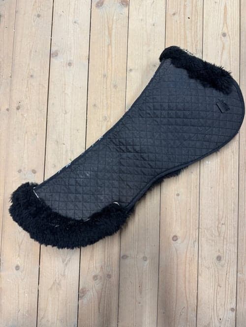 Bild av Svart fårskinnspadd