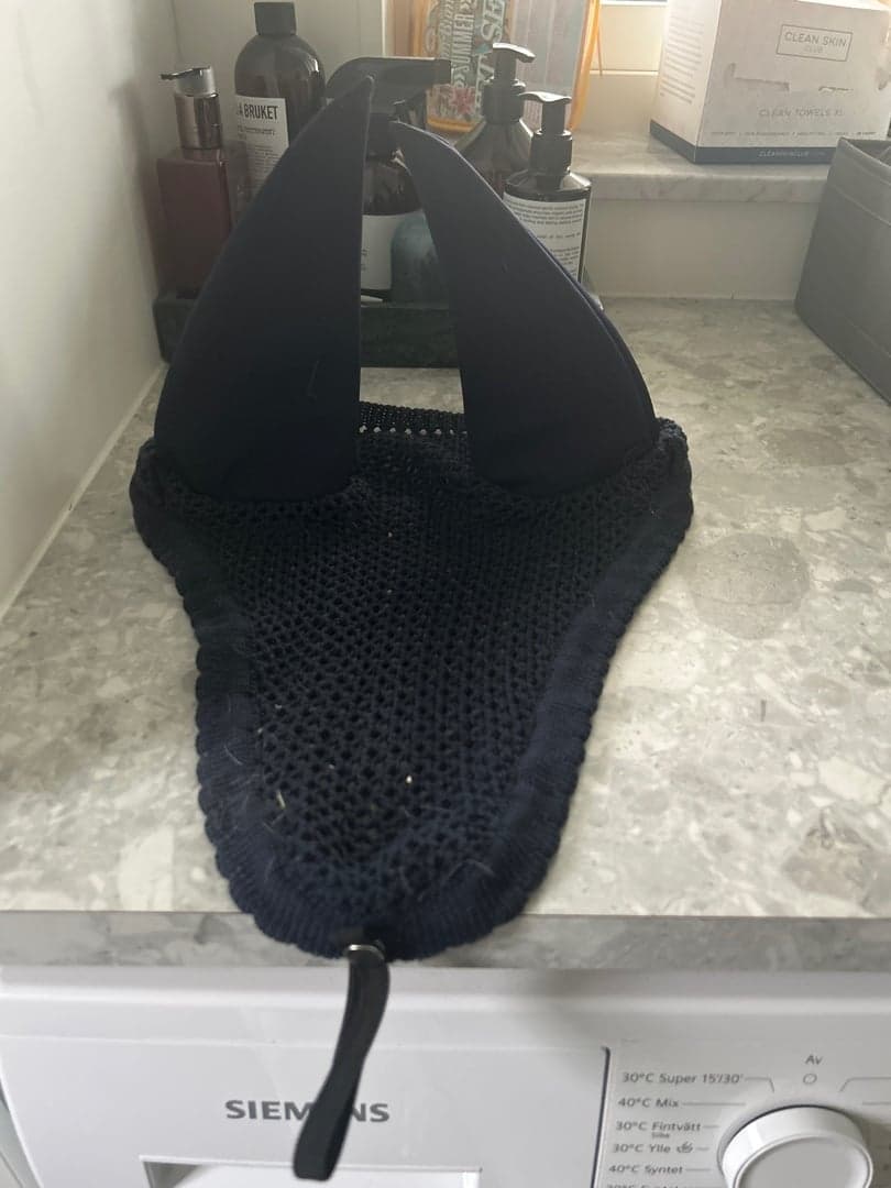 Bild 1 av Mörkblå Grand Prix Huva