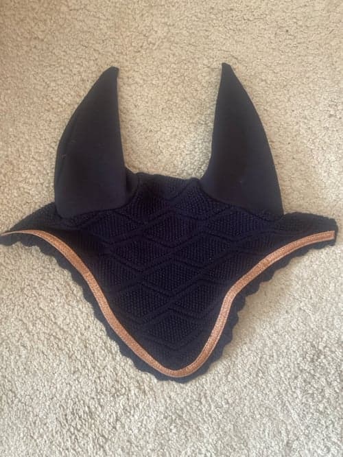 Image of Mörkblå huva med rosé guld