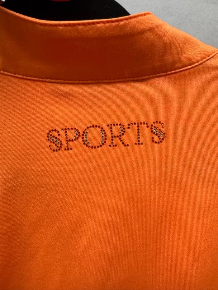Media 2 av Orange ridtopp